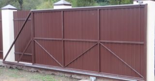Купить откатные ворота из профнастила Ангарск, цена от 1801 руб.