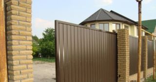 Купить откатные ворота из профнастила Ангарск, цена от 1801 руб.